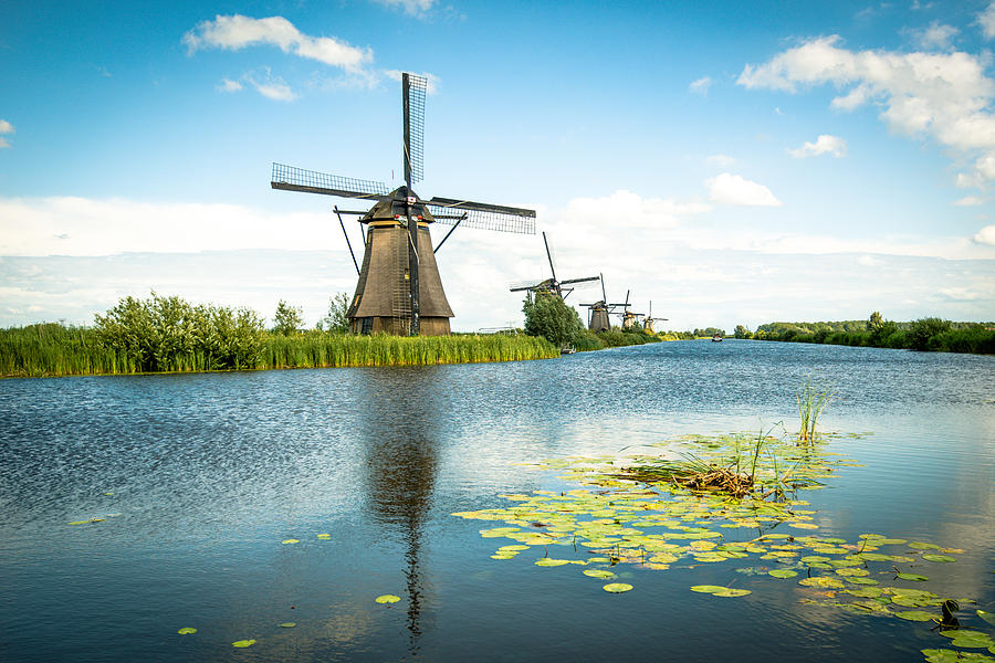 Picturesque Kinderdijk Photograph by Hannes Cmarits