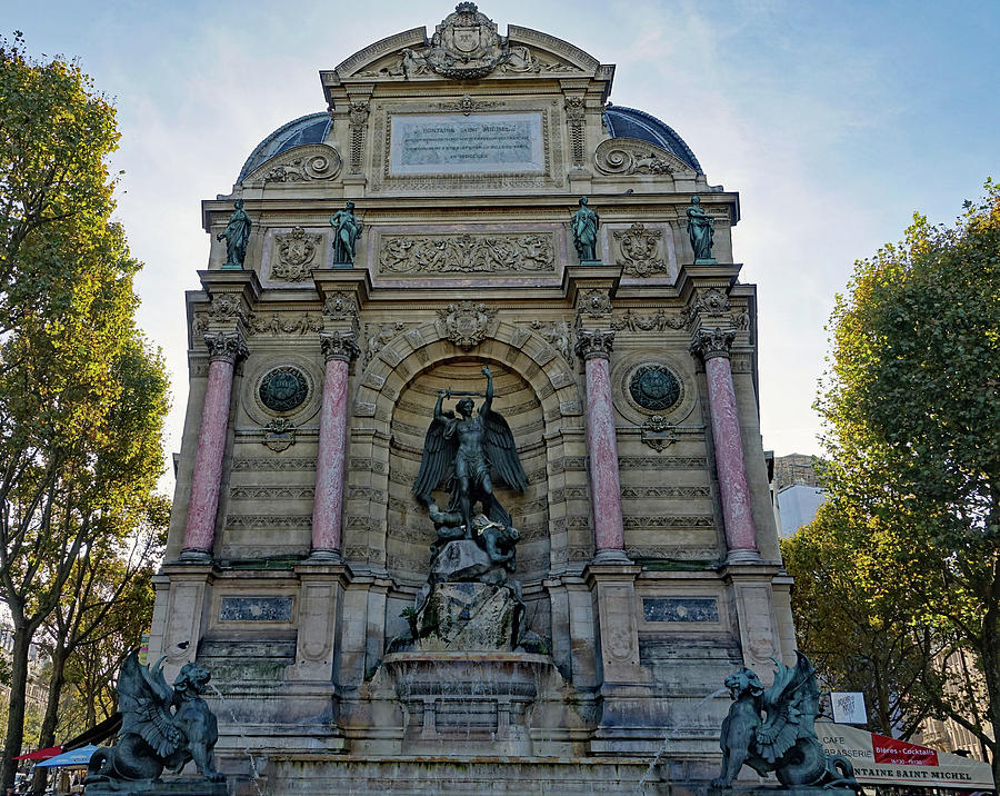 Public Fountain At Place St. Michel In Paris, France #1 Photograph by Rick Rosenshein