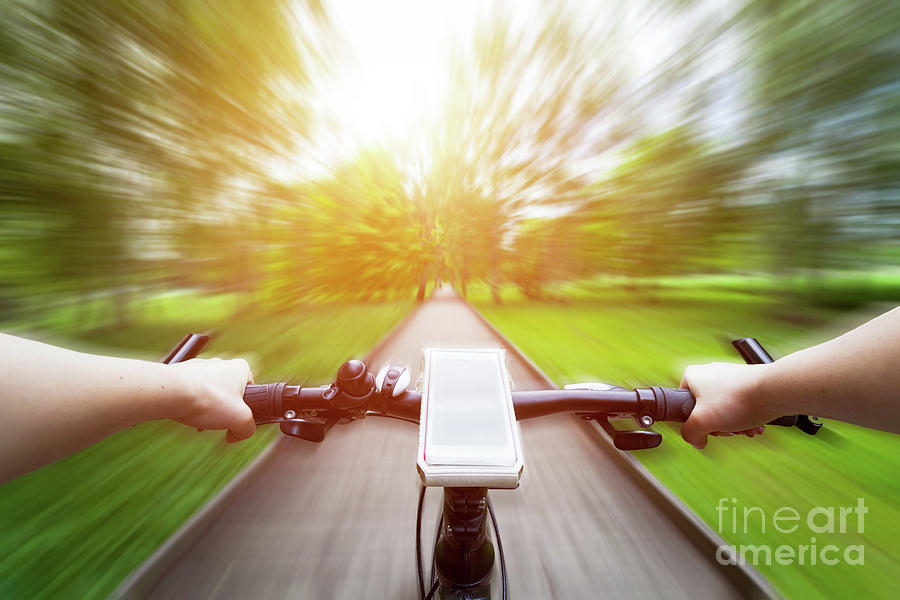 Riding a bike first person perspective. Smartphone on handlebar. Speed motion blur #1 Photograph by Michal Bednarek