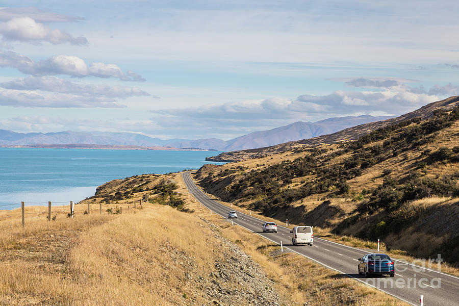 Road along lake Pukaki off Mt Cook in New Zealand #1 Photograph by Didier Marti