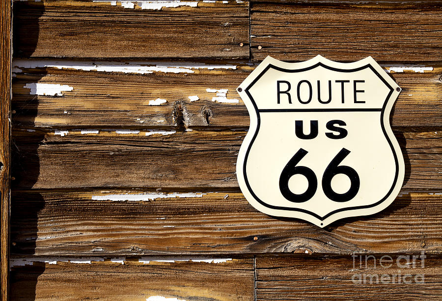 Route 66 road sign on old wooden barn #1 Photograph by Anthony Totah