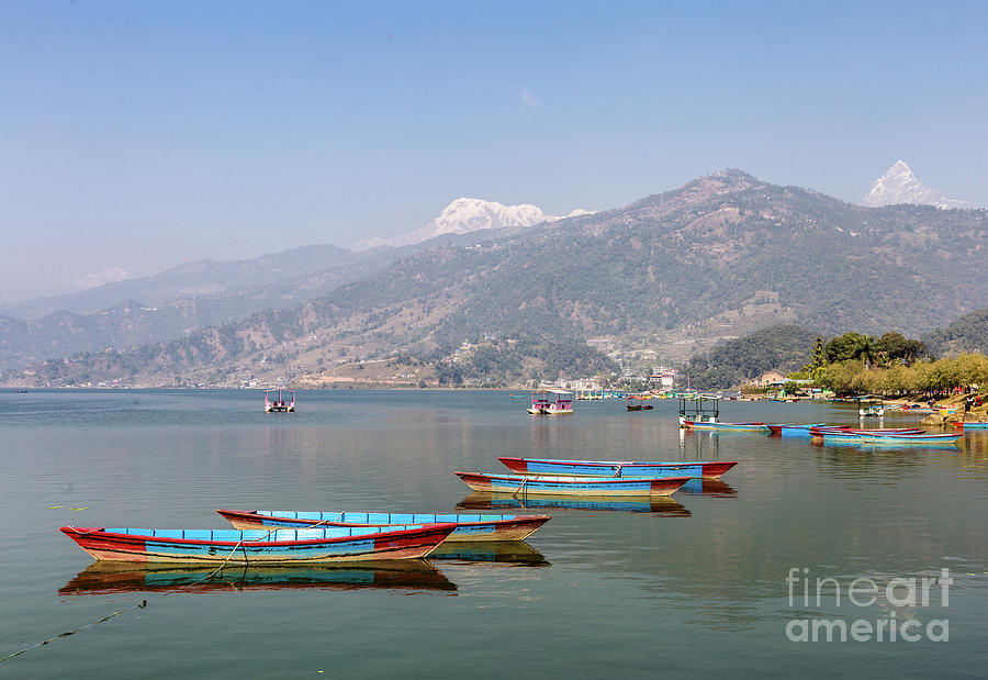 rowbaots in Phewa lake in Pokhara in Nepal #1 Photograph by Didier Marti