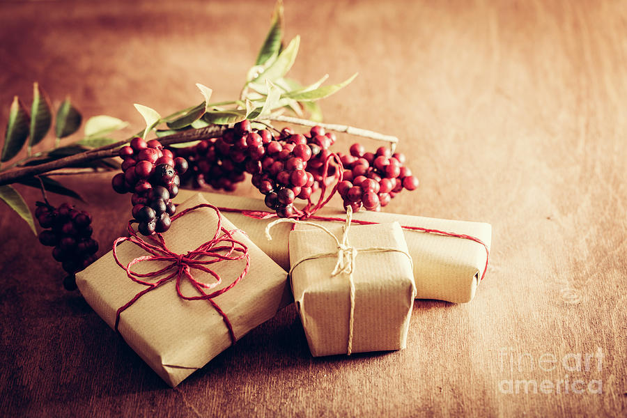 Christmas Photograph - Rustic retro gift, present boxes with decorations. Christmas time, eco paper wrap. #1 by Michal Bednarek