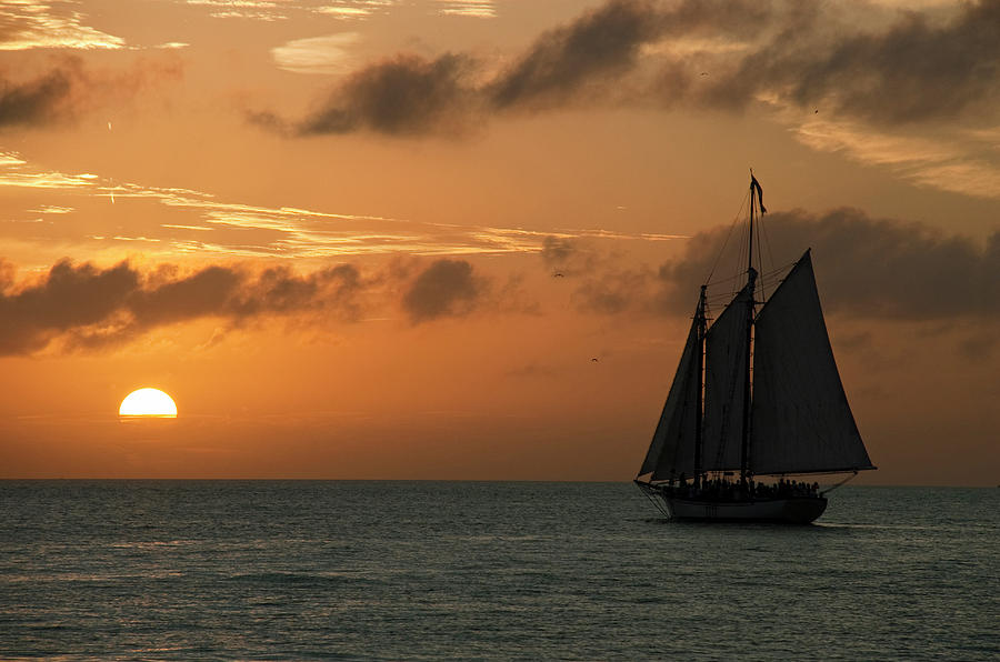 Sailing into the Sunset Photograph by Robert Shard