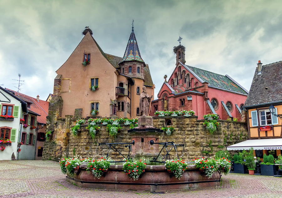 Saint-Leon fountain in Eguisheim, Alsace, France #1 Photograph by Elenarts - Elena Duvernay photo
