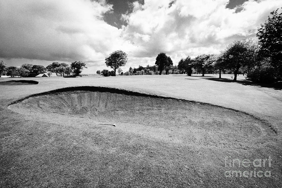 sand bunker with a view of the pin at Cushendall golf club County ...