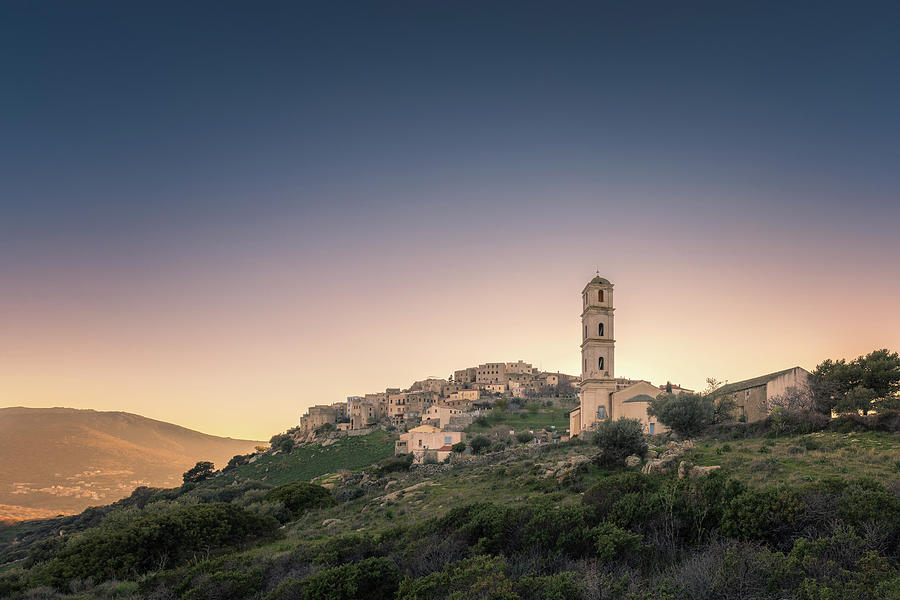Sant Antonino church and village in Balagne region of Corsica #1 Photograph by Jon Ingall