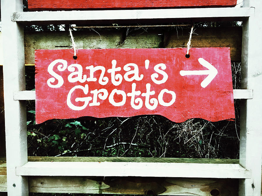 Santas grottos sign  #1 Photograph by Tom Gowanlock