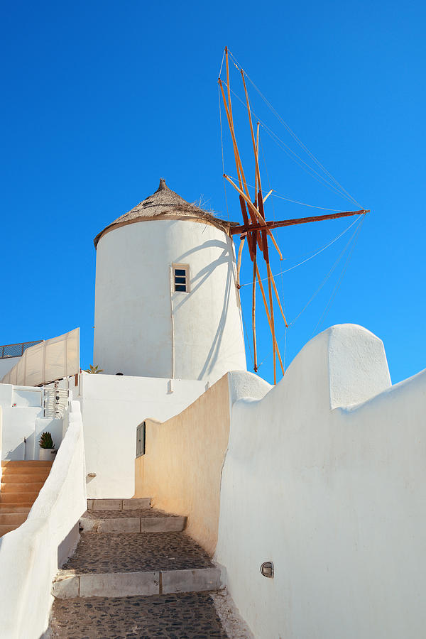 Santorini island windmill #1 Photograph by Songquan Deng