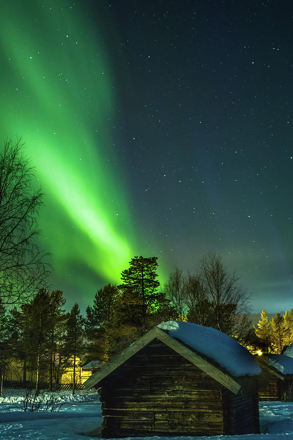 Sapmi Village Under the Northern Lights Karasjok Norway #1 Photograph by Adam Rainoff