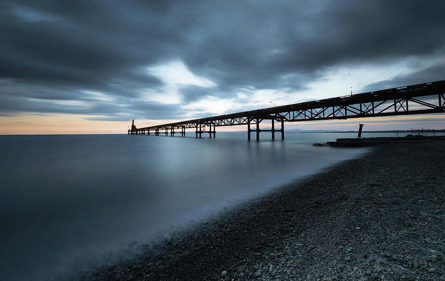 Seascape with jetty during a dramatic cloudy sunset #3 Photograph by Michalakis Ppalis