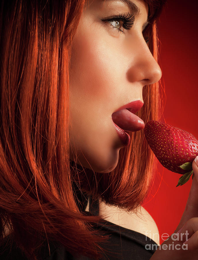 Seductive woman eating strawberry #1 Photograph by Anna Om