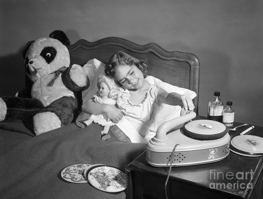 Sick Girl Playing Records, C.1950s #1 Photograph by Debrocke/ClassicStock