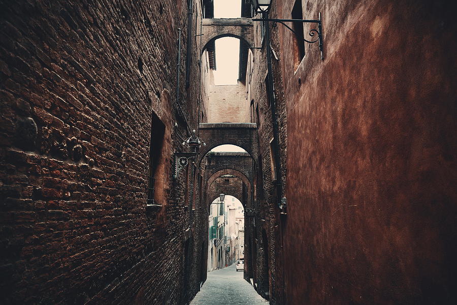 Siena street archway #1 Photograph by Songquan Deng