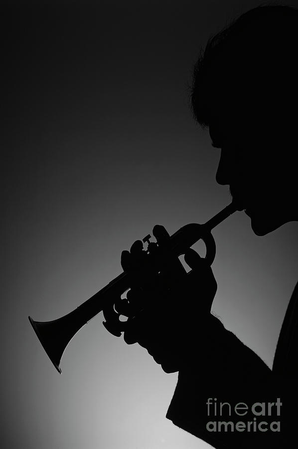 Silhouetted Man Playing Trumpet #1 Photograph by Jim Corwin