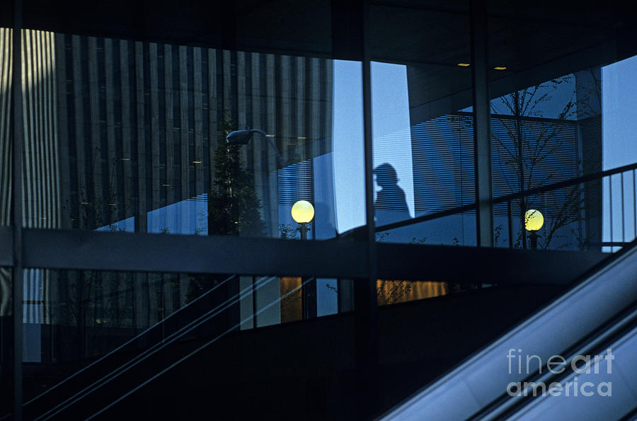 Silhouetted Woman in Business Complex #1 Photograph by Jim Corwin