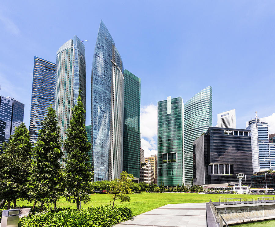 Singapore financial district skyline on a sunny day. #1 Photograph by Didier Marti