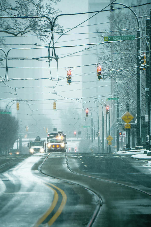 Snowy Winter Weather Streets In A Big City  #1 Photograph by Alex Grichenko