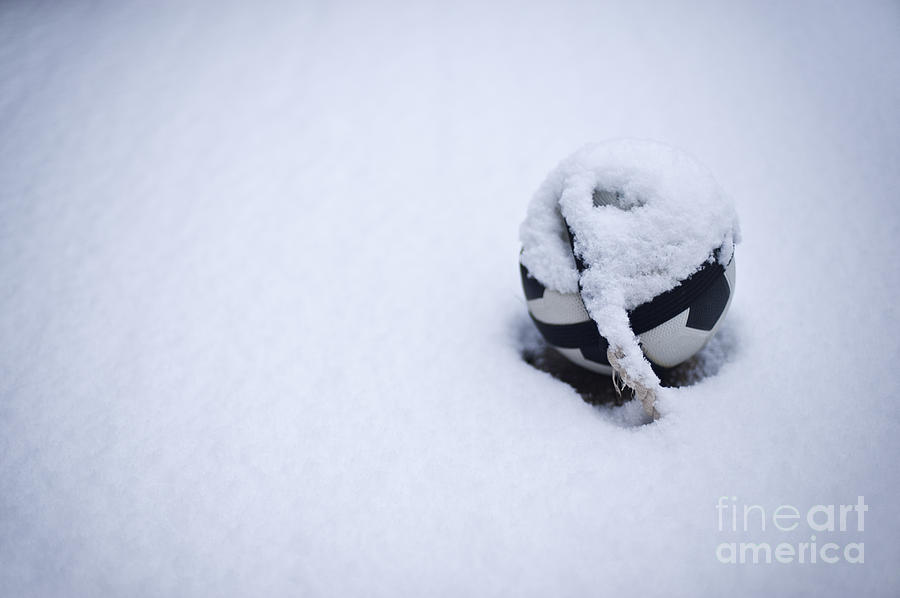 Soccer Ball Covered In Snow #1 Photograph by Jim Corwin