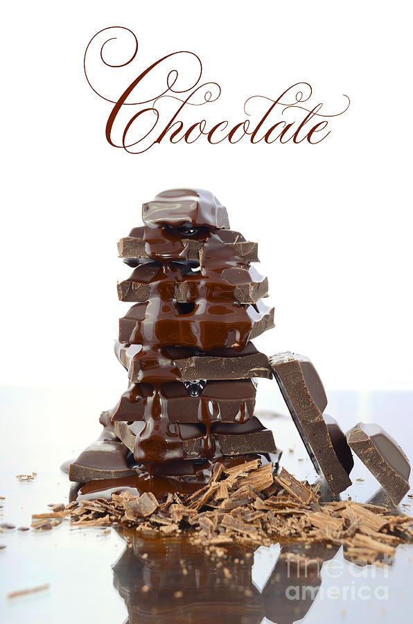 Stack of chocolate on reflective glass #2 Photograph by Milleflore Images