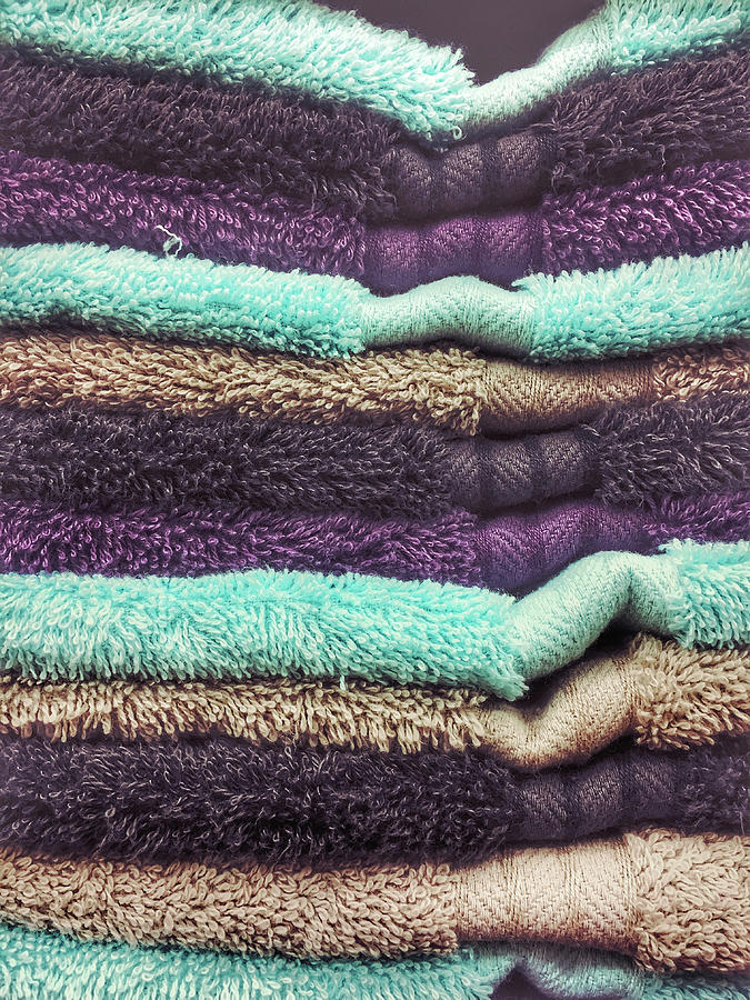 Stack of colourful towels Photograph by Tom Gowanlock - Fine Art America