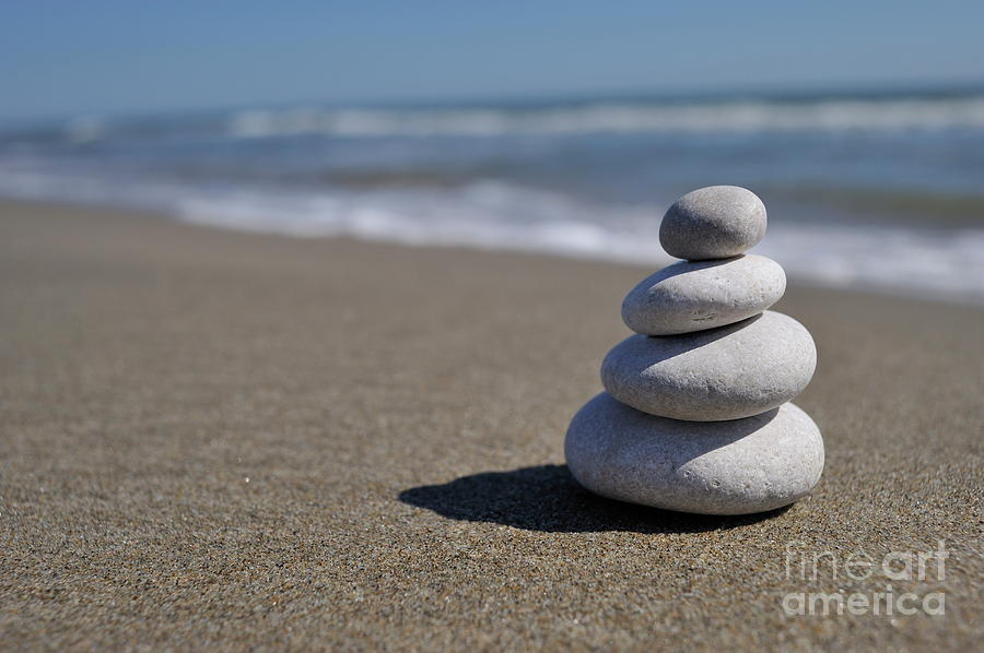 Nature Photograph - Stack of pebbles on beach #1 by Sami Sarkis