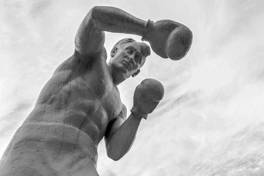Black And White Photograph - Stone Man Boxer  by John Williams