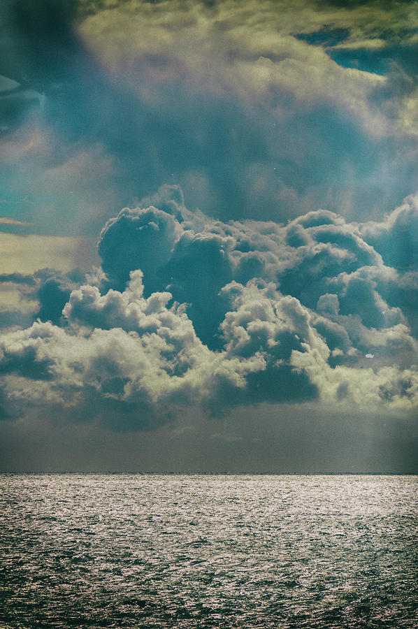 Storm clouds over sea Photograph by Ken Welsh - Fine Art America