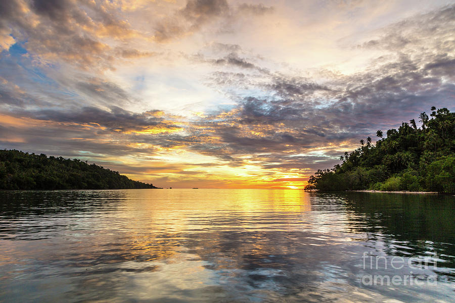 Stunning sunset in the Togian islands in Sulawesi #1 Photograph by Didier Marti