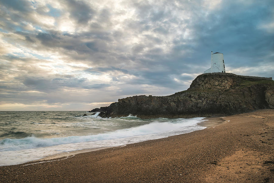 Sunset Photograph - Stunning Twr Mawr lighthouse landscape from beach with dramatic  #1 by Matthew Gibson