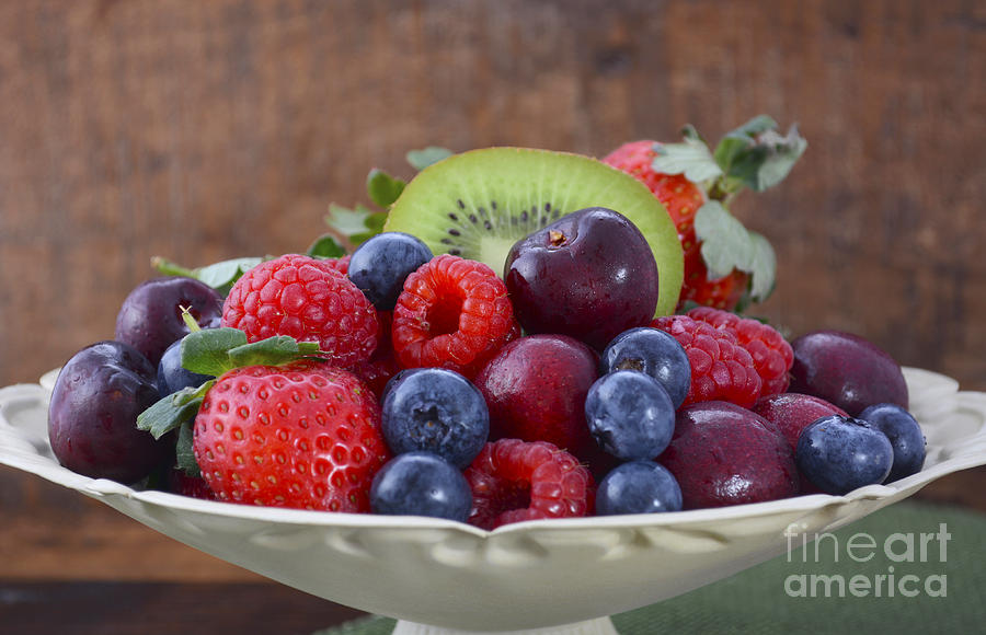 Summer Fruit in Vintage Bowl on Dark Wood Table.  #1 Photograph by Milleflore Images