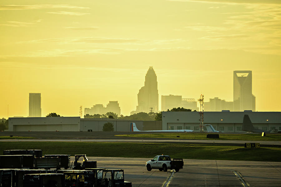 Sun Rising Early Morning Over Charlotte Skyline Seen From Clt Ai #1 Photograph by Alex Grichenko