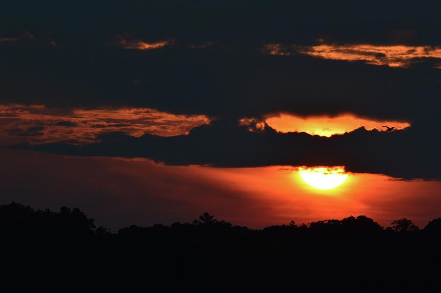 Sun Setting Below A Cloud  #1 Photograph by Lyle Crump