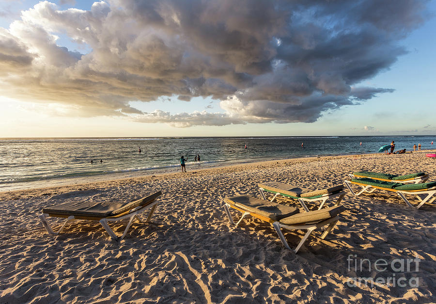 Sunset over Flic en Flac beach in Mauritius.  #1 Photograph by Didier Marti