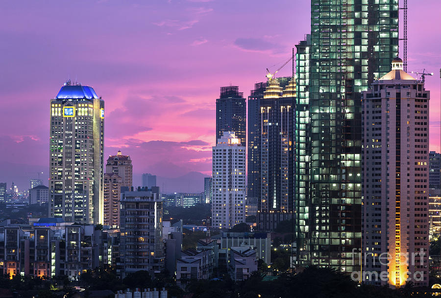 Sunset over Jakarta business district #1 Photograph by Didier Marti