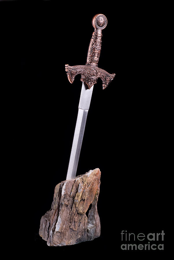 sword in the stone symbol of King Arthur  #1 Photograph by Arletta Cwalina