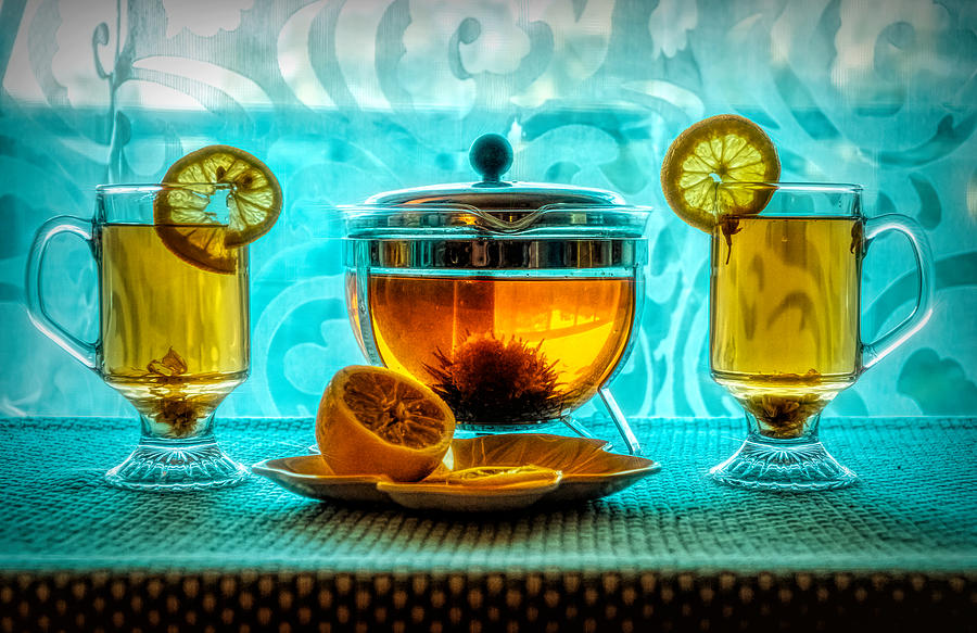 Tea and lemon Photograph by Lilia D