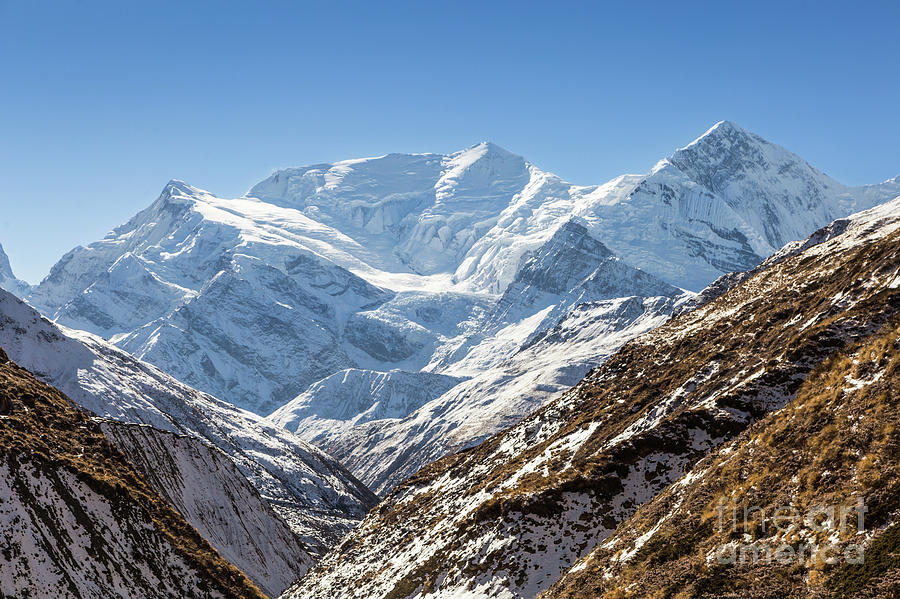 The Annapurna III and the Gangapurna peaks in the Himalayas in N #1 Photograph by Didier Marti