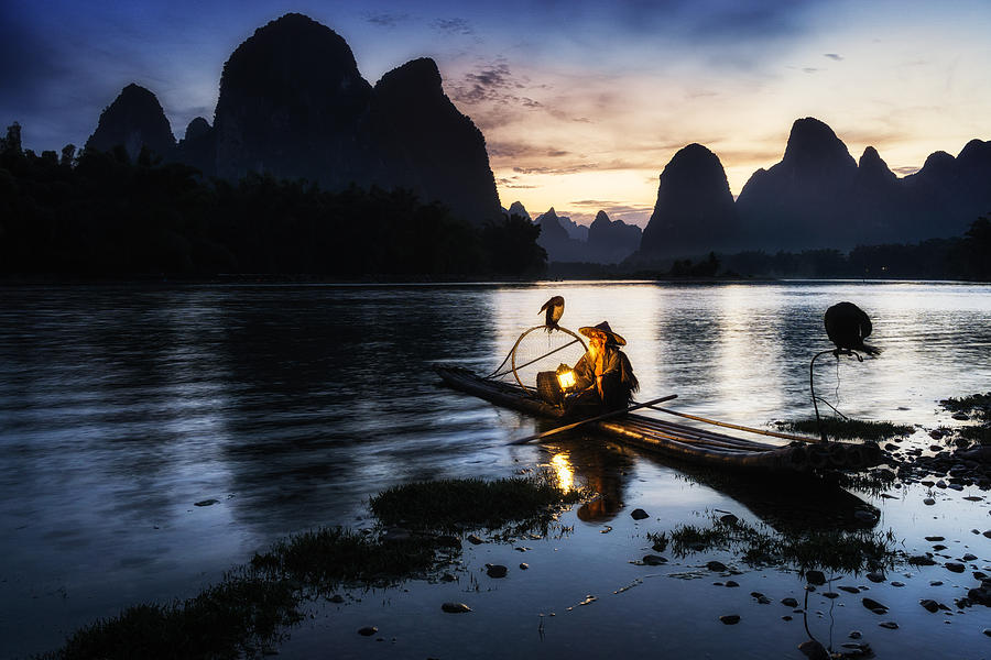 Mountain Photograph - The cormant fisherman in li river #2 by Aaron Choi
