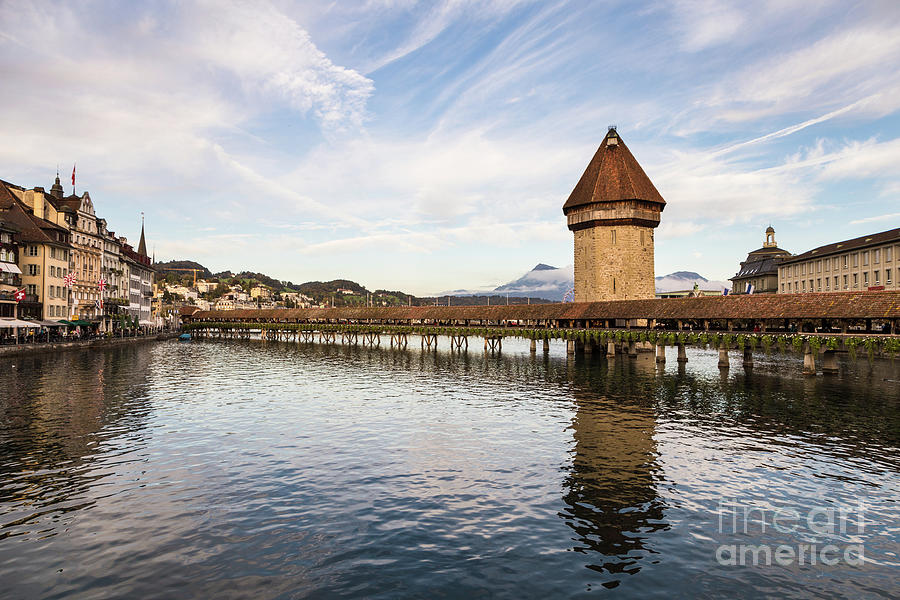 The famous wooden Chapel bridge in Lucerne #1 Photograph by Didier Marti