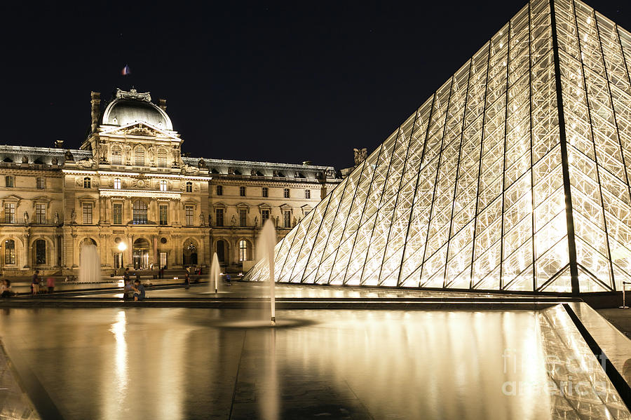 The Louvre at night in Paris #1 Photograph by Didier Marti