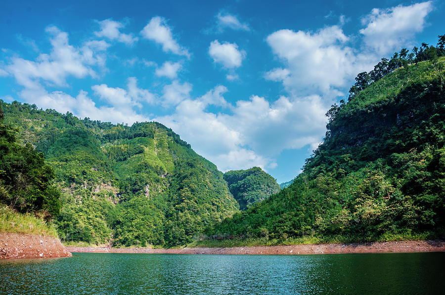 The mountains and reservoir scenery with blue sky #1 Photograph by Carl Ning