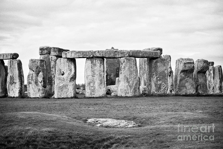 The Slaughter Stone In Front Of View Of Circle Of Sarsen Stones With