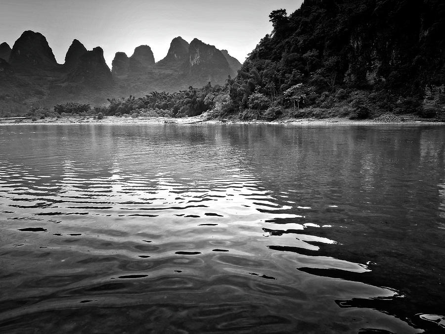 The sun goes down on the mountain-China Guilin scenery Lijiang River in Yangshuo #1 Photograph by Artto Pan