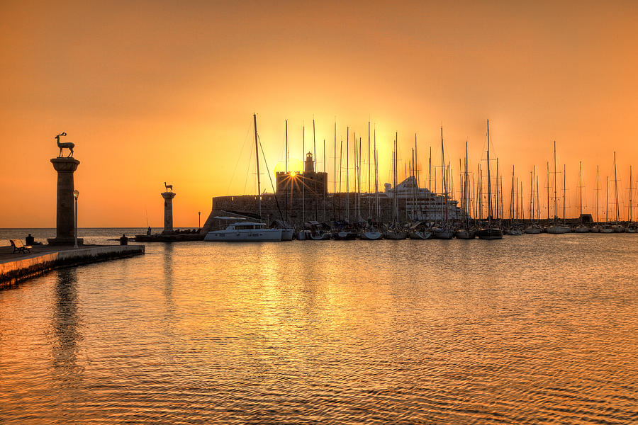 The sunrise at the old port of Rhodes - Greece #1 Photograph by Constantinos Iliopoulos