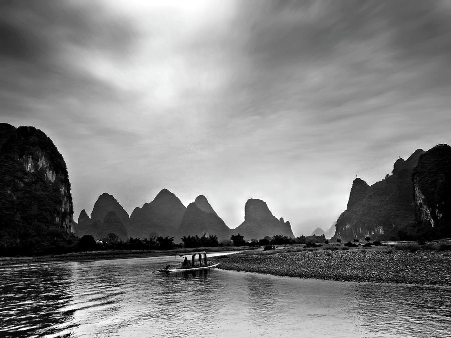 The sunset is fine but it is near dusk-China Guilin scenery Lijiang River in Yangshuo #1 Photograph by Artto Pan