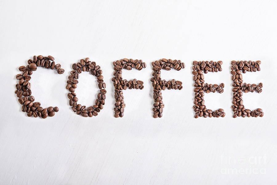 The word coffee from coffee beans Photograph by Piotr Marcinski Fine