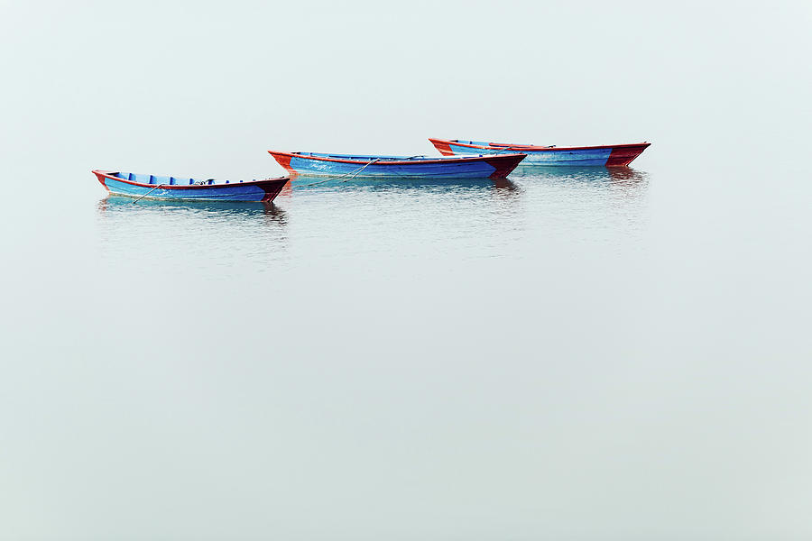 Three blue boats on Phewa Lake in Pokhara #1 Photograph by Dutourdumonde Photography