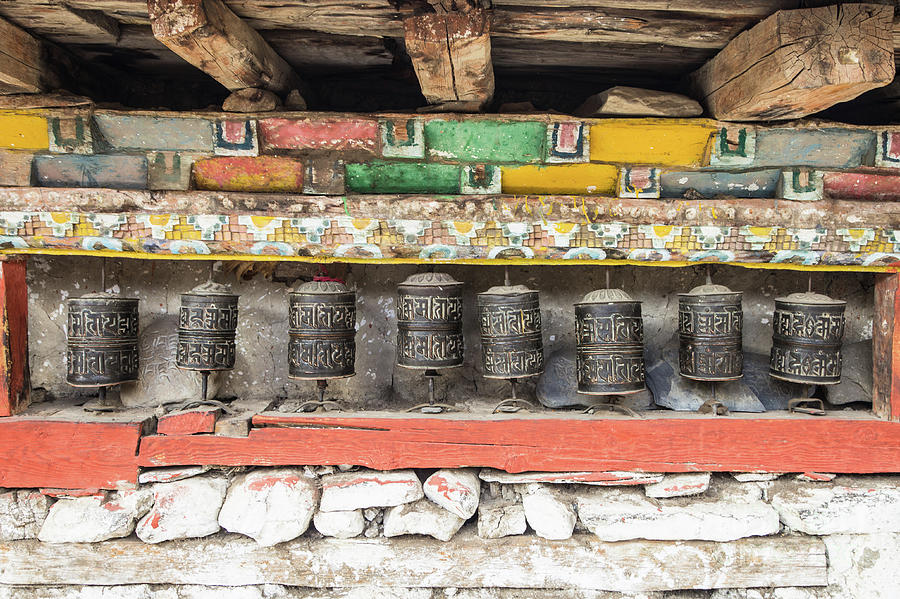 Tibetan Buddhism prayer wheels in Manang Photograph by Didier Marti ...