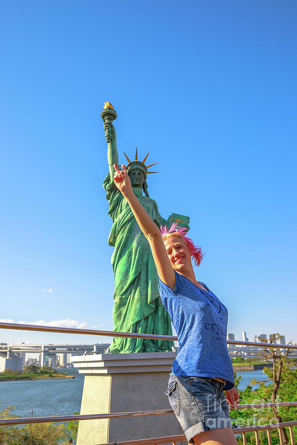 Tourist at Statue of Liberty #1 Photograph by Benny Marty